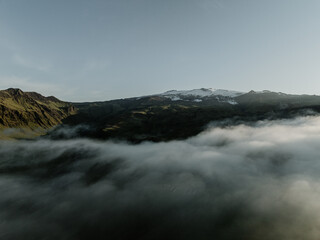 Fototapeta premium Morning mist over Eyjafjallajökull glacier and volcanic landscape in South Iceland