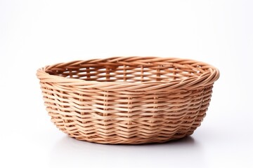 Obraz premium Handcrafted wicker basket on white background