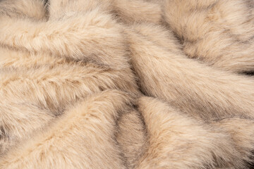 Texture of faux fur as a background, top view.