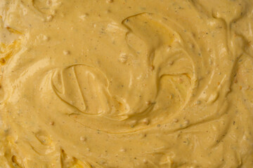 Yellow sauce splashes as a background.