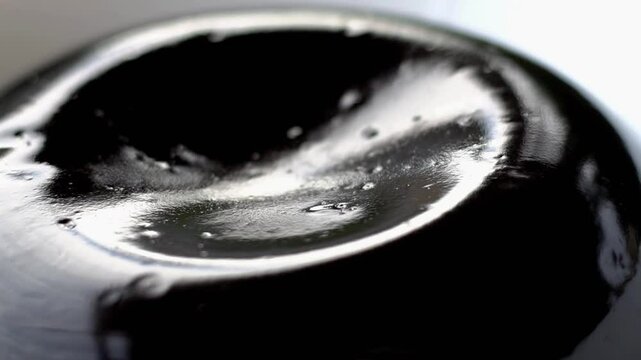 Healthy dessert. A kind of Chinese vegetable jelly black in color, Grass jelly (Mesona chinensis) It's Southeast Asia Dessert made from herb boiling with sugar. Asian cool dessert for healty