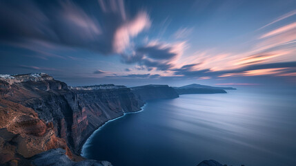 A dramatic long exposure of the volcanic cliffs of Santorini, with silky waves rolling against the base and streaking clouds glowing in twilight hues