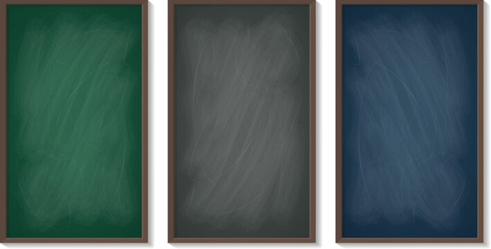 Three classic dark gray, green and navy blue chalkboards in wooden frames, empty blackboards for school classroom, cafe or restaurant menu