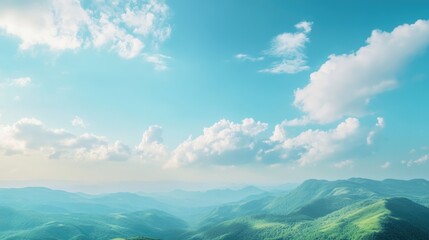 Obraz premium Breathtaking mountain valley landscape with clear blue skies and lush green vegetation.