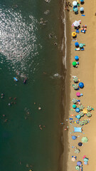 Aerial perpendicular view of a sandy beach located in Bacoli, near Naples, Campania, Italy. There...