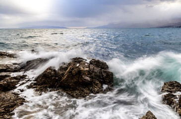 Long exposure of waves on the coast of Croatia in the evening mood