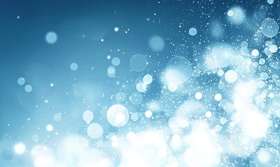 Abstract blue bokeh background with glowing lights for festive designs