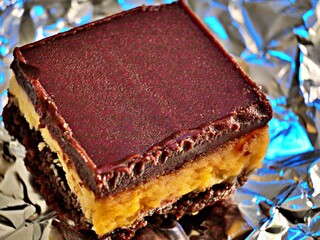 Home made Nanaimo bar on piece aluminum foil