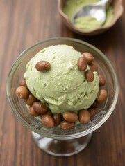 A delicious scoop of matcha green tea ice cream topped with sweet azuki beans and a sprinkle of matcha powder, served in a glass dish on a wooden table, ice cream, scoop, dairy-free