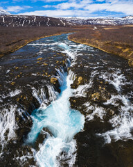 Aerial view of Bruarafoss waterfall with turquoise waters in south Iceland.