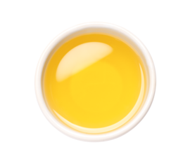 Cooking oil in bowl isolated, top view.