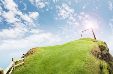 Stunning golf course perched on cliffs with dramatic views and bright sky