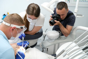 Dental treatment. Woman on dental examination. Professional equipment in dental clinic....