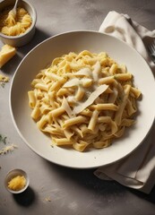 A steaming plate of freshly cooked pasta with a generous portion of creamy sauce and melted parmesan cheese, Italian food, culinary art