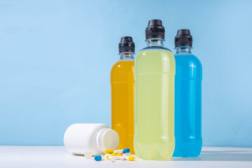 Multivitamin-rich water, healthy drinks with an additional source of vitamins, micro and macro elements, bright drinks bottle with vitamin infused water on a sunny background