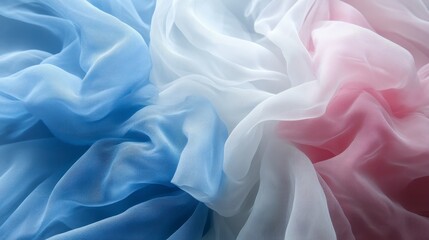 Obraz premium Elegant Pastel Blue White and Pink Sheer Fabric Drape Texture Background