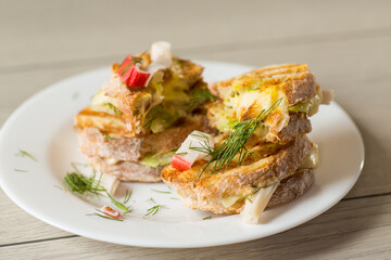 Sandwiches with vegetable and cheese filling