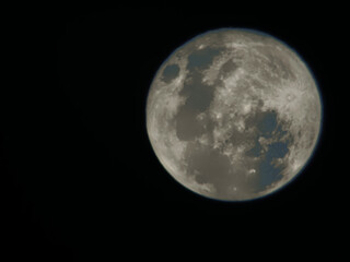 full moon in the dark night sky