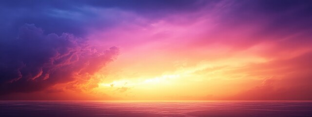 Obraz premium Colorful sunset over calm ocean with dramatic clouds and reflections in the water Copy Space