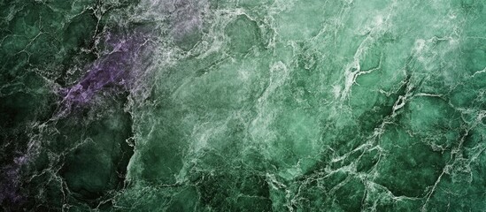 Naklejka premium Abstract green and purple textured background with marble effect and copy space for overlay text
