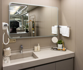 Modern clean hotel bathroom sink