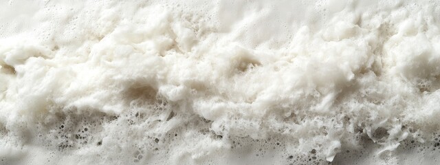 Ocean wave foam texture background with white froth and Copy Space for overlay text
