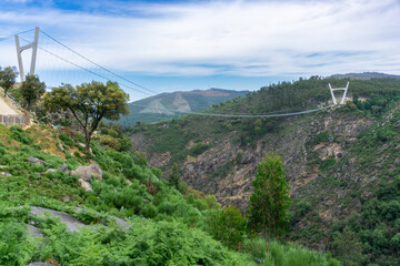 Panoramic view of the 516 Arouca suspension bridge in Aveiro Portugal surrounded by nature