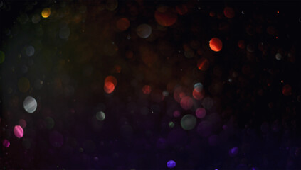 Holiday abstract bokeh on black background. Festive sparkling gold dust. Holiday concept © Intel