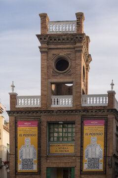 SEVILLE, SPAIN - MARCH 14, 2016:  Exterior view of Artisan Market (El Postigo) which is housed in the old fish market with sign