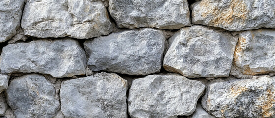 Obraz premium Light gray stone texture showcasing cool and smooth surfaces with neutral tones