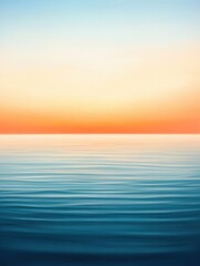 Fototapeta premium Tranquil sunset scene over calm ocean waters, with vibrant sky reflecting on the serene sea, creating a peaceful atmosphere.
