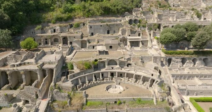 Aerial view of the Villa of the Ambulatio located in the archaeological park of Baia, a hamlet of Bacoli, near Naples, in Campania, Italy. It is a series of terraces leading to the sector of Mercury.