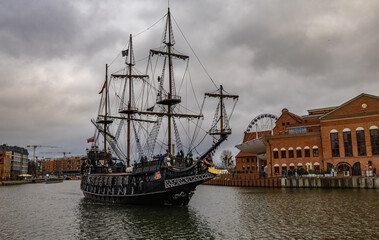 The center of the old town of Gdańsk, a walk along the Motlawa River, historic tenement houses, a...