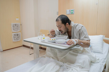 Obraz premium A Hospitalized Patient with Influenza and Gallstones, Receiving IV Therapy and Medications, Under Close Monitoring by Nurses, While Recovering from Abdominal Pain and Surgery