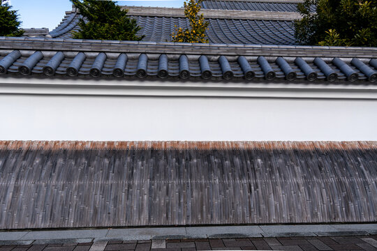 Architecture: Wall and roof of a traditional Japanese house.