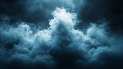 Obraz premium A dark sky with a large cloud that is almost touching the ground