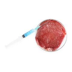 GMO concept. Piece of meat and syringe isolated on white, top view