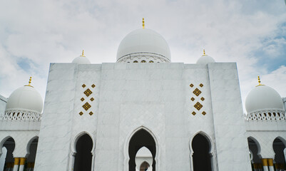 Elegant Sheikh Zayed Grand Mosque Dome of a Marble Building Against a Vibrant Sky