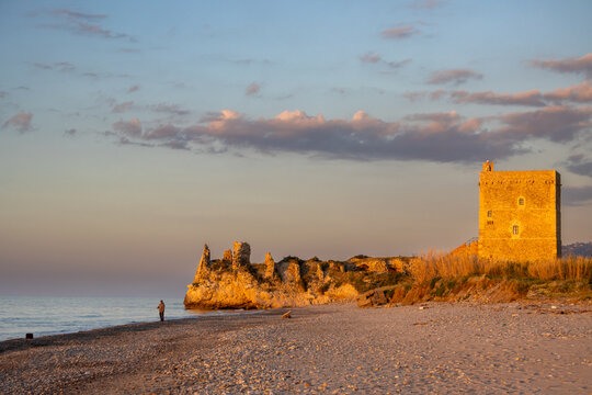 Beach with a historical building, Sicily, Italy