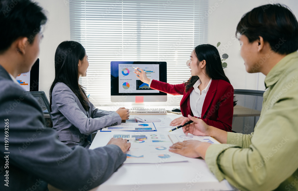 Poster Business team analyzing financial charts and graphs displayed on computer screen during a productive meeting in modern office. Focusing on data analysis. Market trends. And strategic decision-making