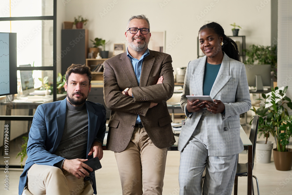 Poster group of successful intercultural subordinates and their boss in formalwear looking at camera while 