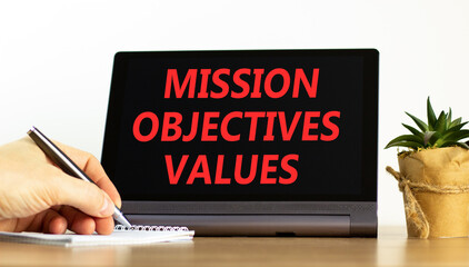 Mission objectives values symbol. Concept words Mission Objectives Values on beautiful black...