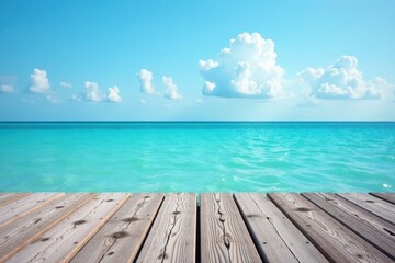 Fototapeta premium Weathered grey wood pier planks over tranquil blue sea, bright summer sky above, blue water, nature, vacation