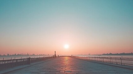 Fototapeta premium Sunrise over calm water, long pier, hazy city skyline.