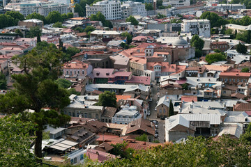 Fototapeta premium Old Town, top view of Tbilisi, Georgia, red roofs of old houses, historic district of the city