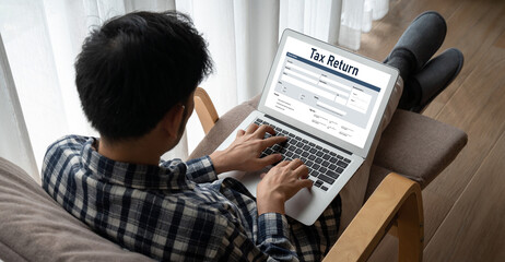 Obraz premium Online tax return form for submitting individual income tax return form snugly on the internet website. Government web for tax payment and return. Taxation technology concept.