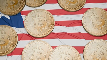 Several bitcoins are laid out on the flag of Liberia