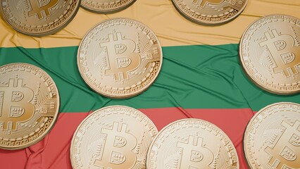 Several bitcoins are laid out on the flag of Lithuania