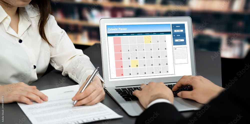 Poster calendar on computer software application for brisk schedule planning for personal organizer and onl