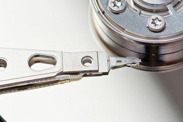 Close-up of a hard drive's arm and platter assembly